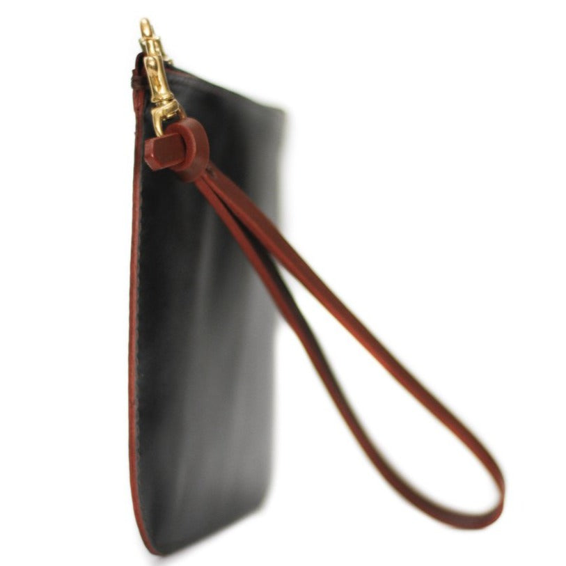 small wrist Clutch bag black leather made in montreal quebec flechr by Kimberly Fletcher