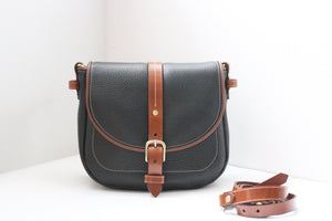 Equestrian black and brown leather saddle bag handmade in Montreal Canada by Designer Kim Fletcher