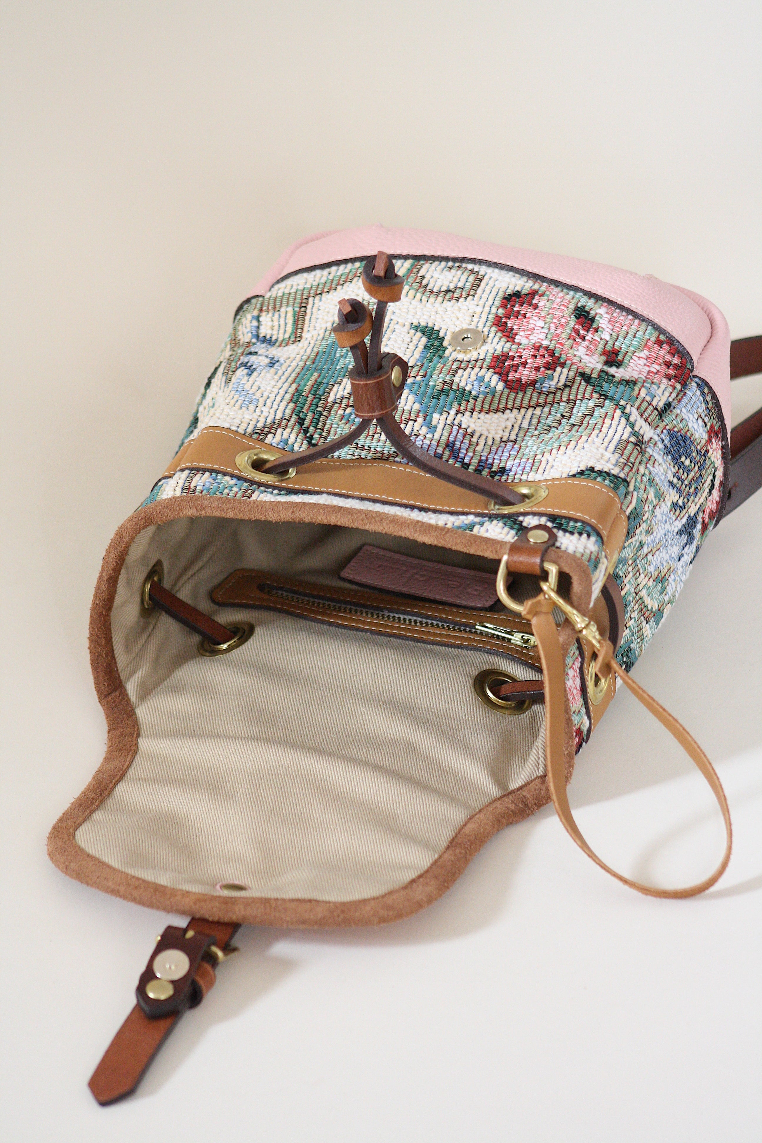 Leather and canvas backpack handmade in Montreal Canada leather designer signature bags